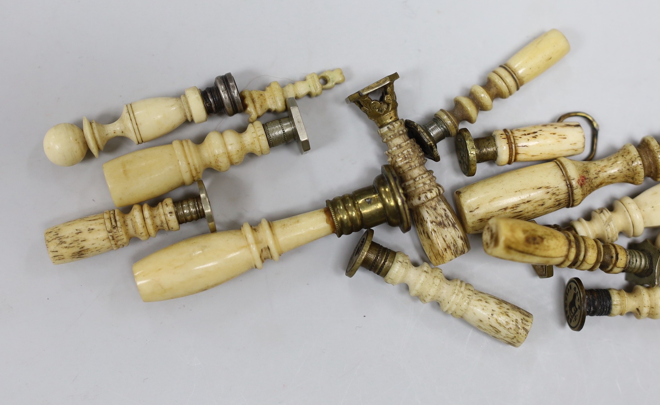 A group of approximately seventeen bone handled desk seals, 19th century and later